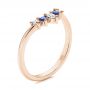 14k Rose Gold 14k Rose Gold Blue Sapphire And Diamond Wedding Band - Three-Quarter View -  106269 - Thumbnail